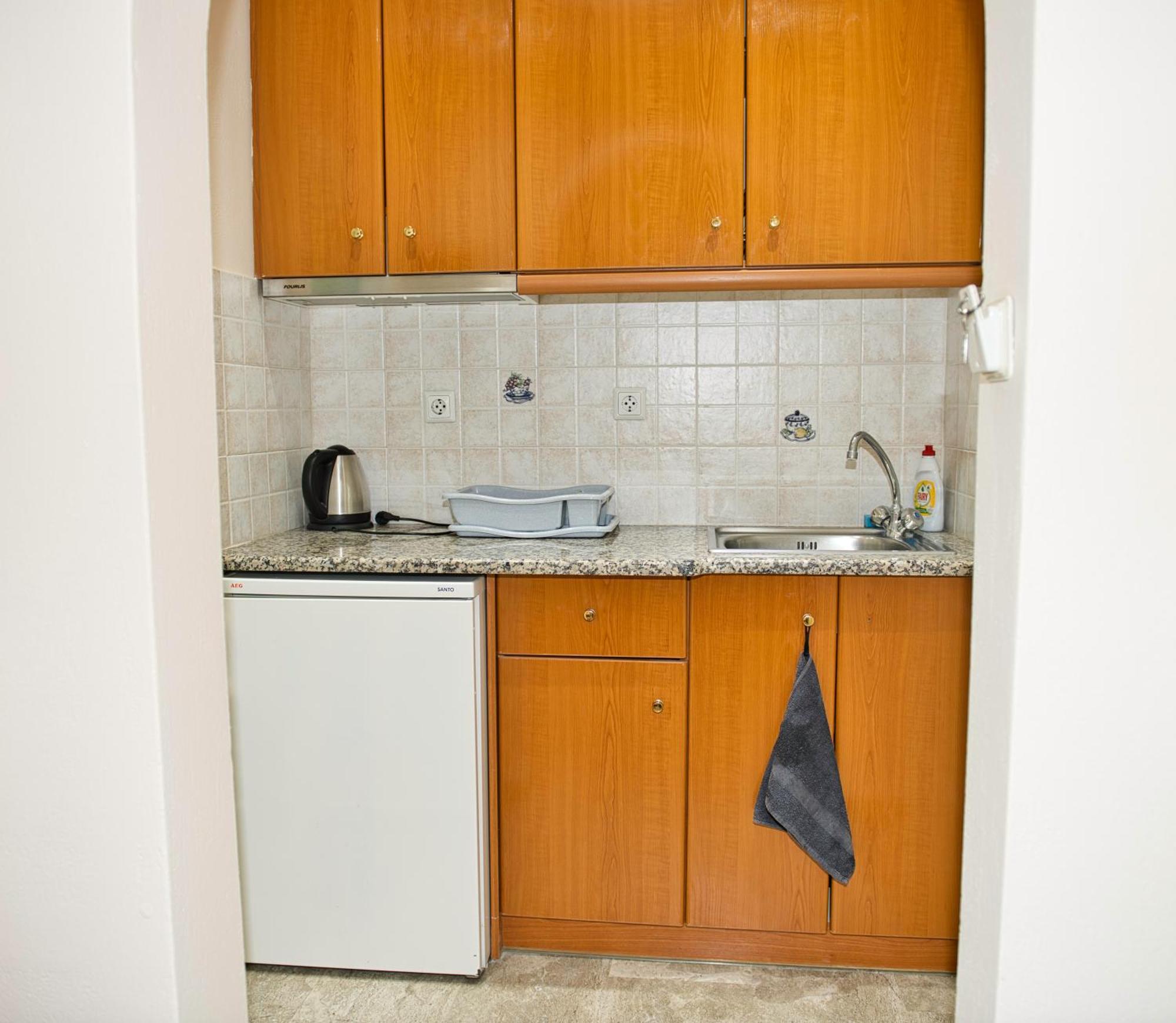 Villa Nikos Karamolegkos Kamari ภายนอก รูปภาพ